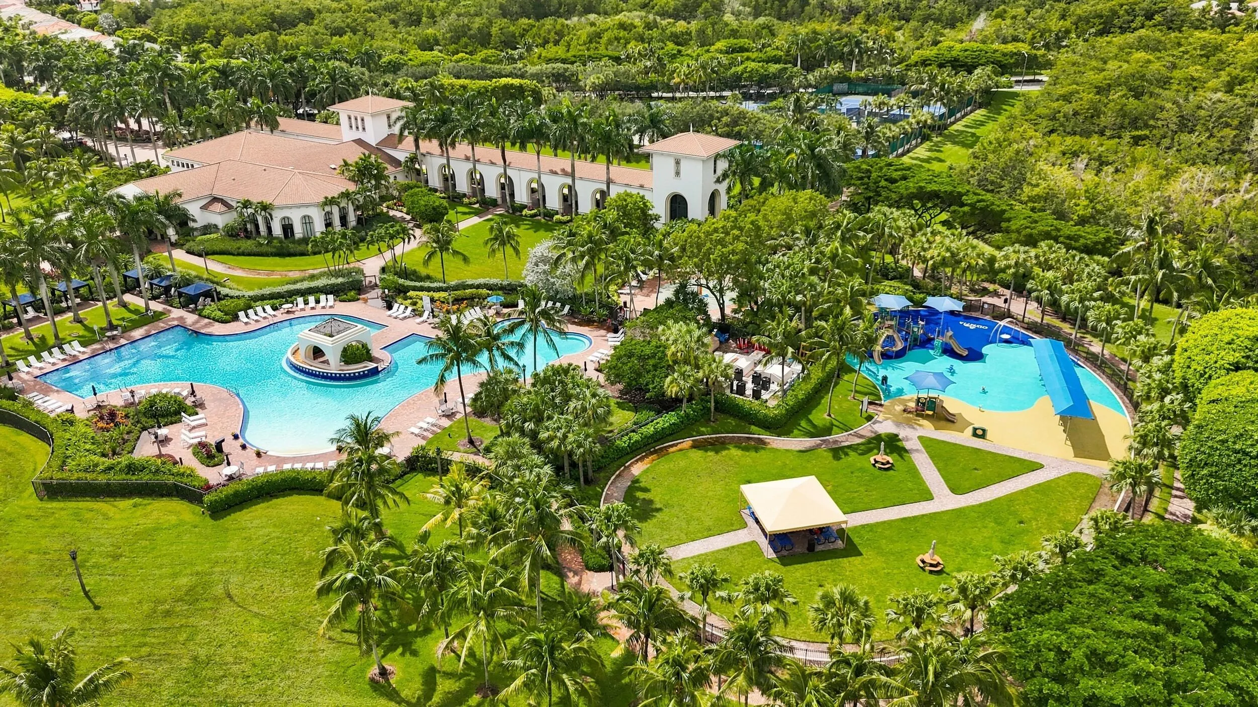 Clubhouse has large pool, spa, kiddie pool and open green areas