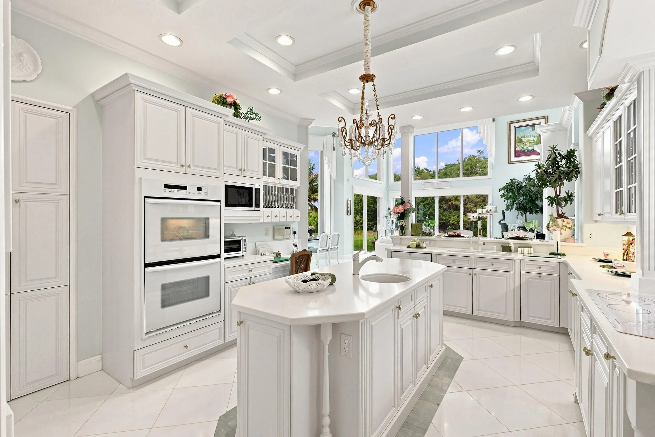White appliances throughout with double ovens