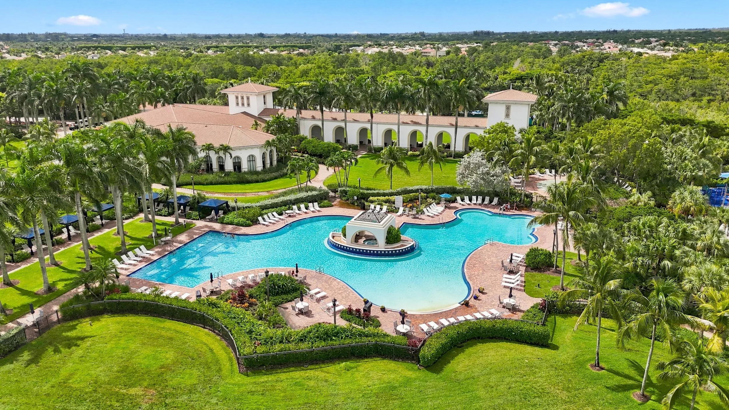 Clubhouse has large pool, spa, kiddie pool and open green areas