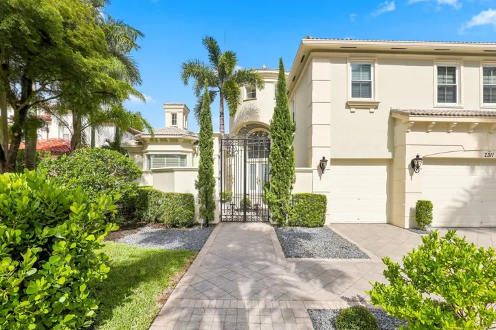 Elegant Palm Beach designed estate home in Stotesbury Village in Olympia, Wellington FL. 4,830 sq ft with 5 Bedrooms & 6 1/2 bathrooms on large premium lake and nature preserve lot.