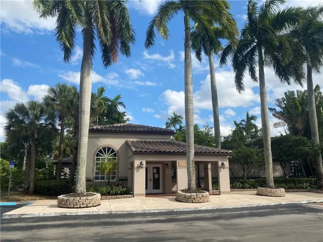 Mediterranean-inspired architecture with a tiled roof and stucco exterior