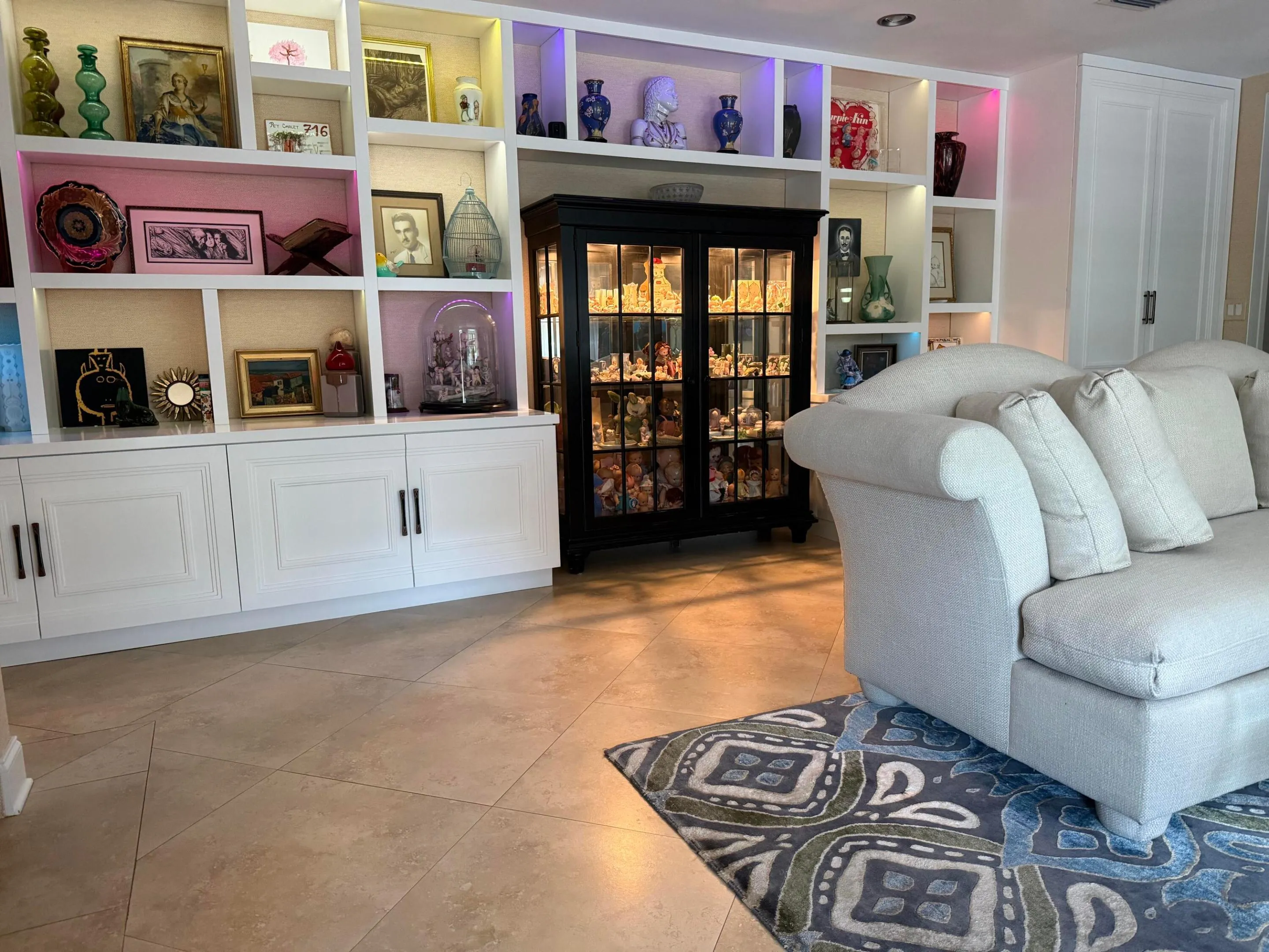 Custom built-in cabinetry and storage with LED lighting.