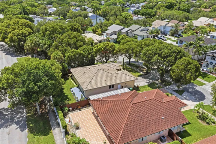 Ariel View House with Light Barrel Tile Roof