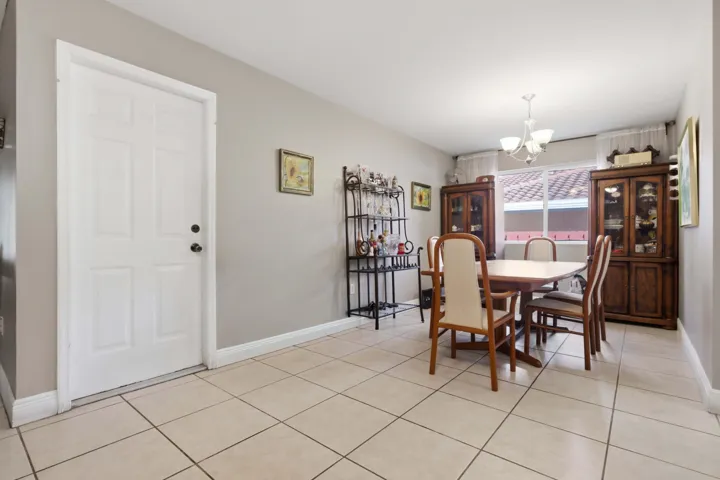 Main Dining Room w Door to Garage