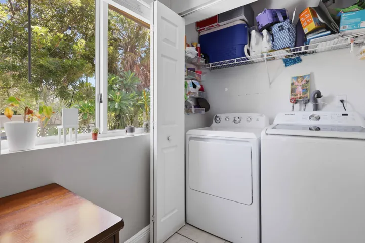 Laundry Closet with Standard Size Energy saver Washer and Dryer