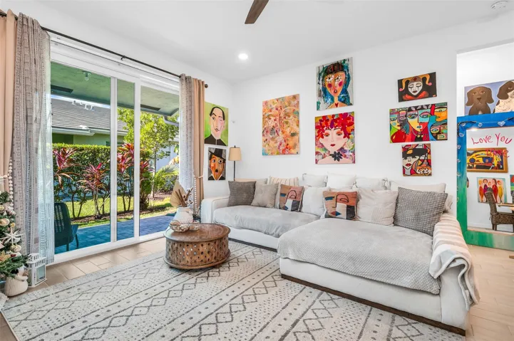 Tile flooring, recessed lighting, and a ceiling fan