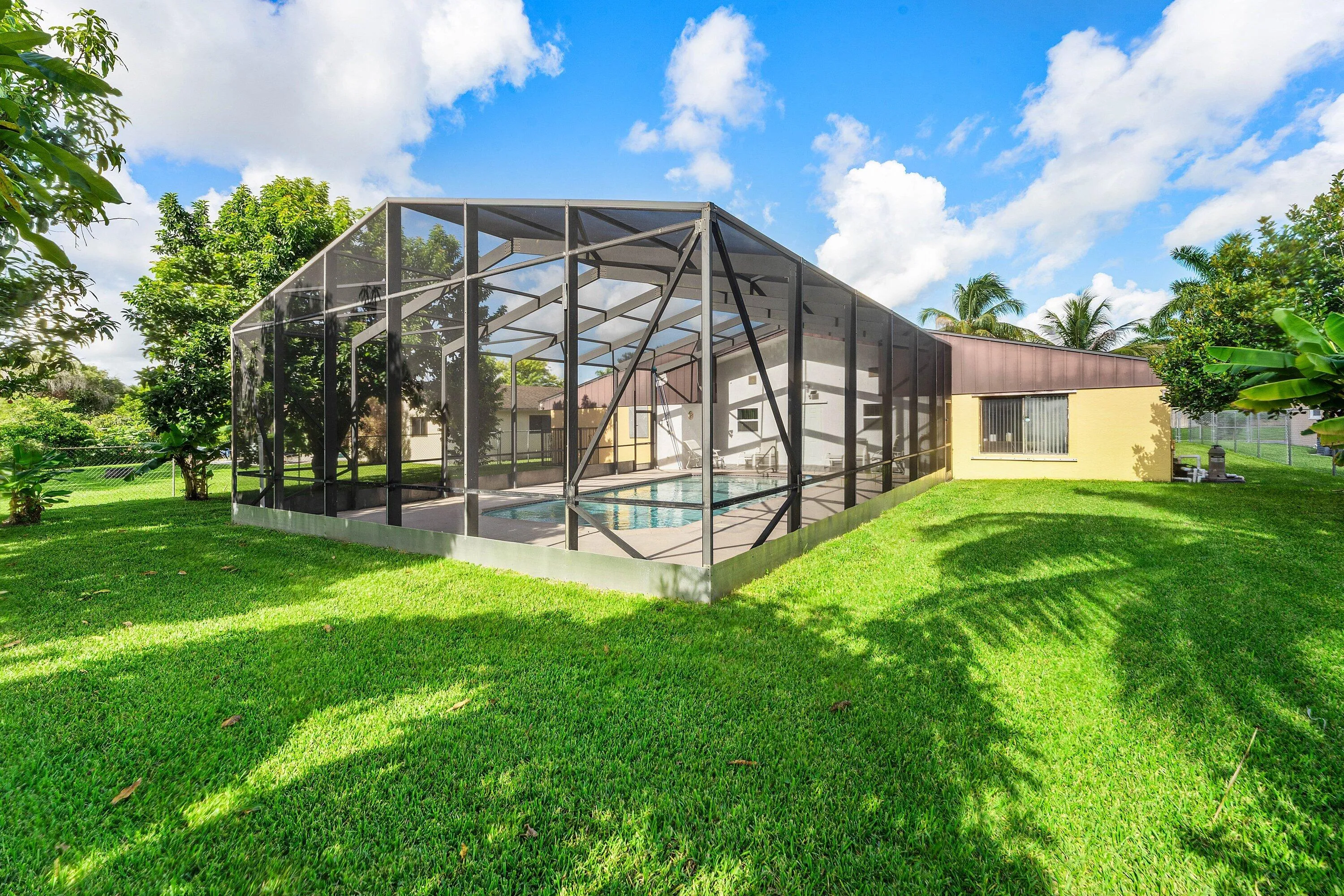 Large Fruited Backyard with room to roam, overlooking the Golf Course