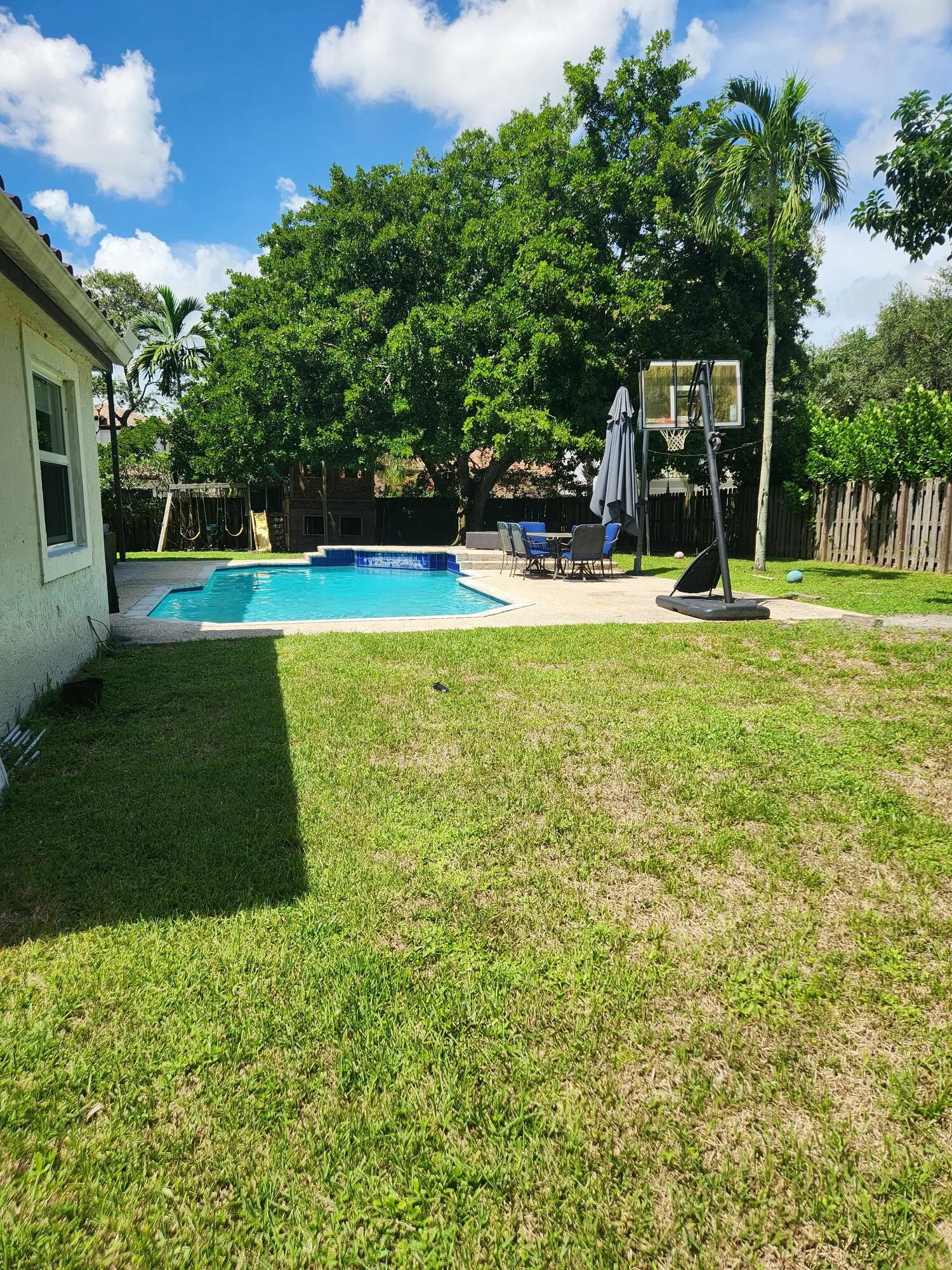 Behind the house grassy area