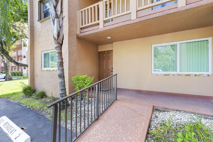 Exterior Front - Corner Unit with Parking Space in Front
