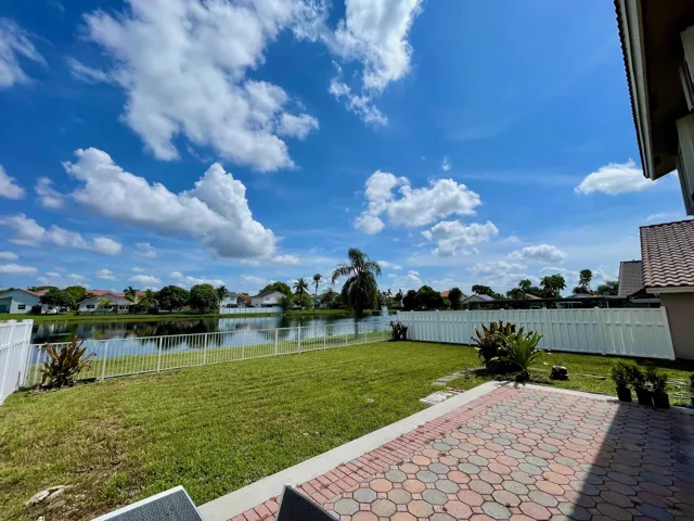 Fenced Waterfront Backyard