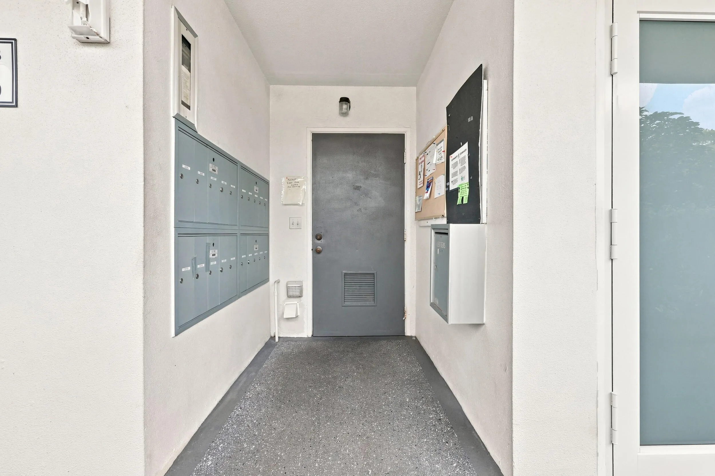Convenient community laundry & mail area located just steps from the residence for easy everyday access.