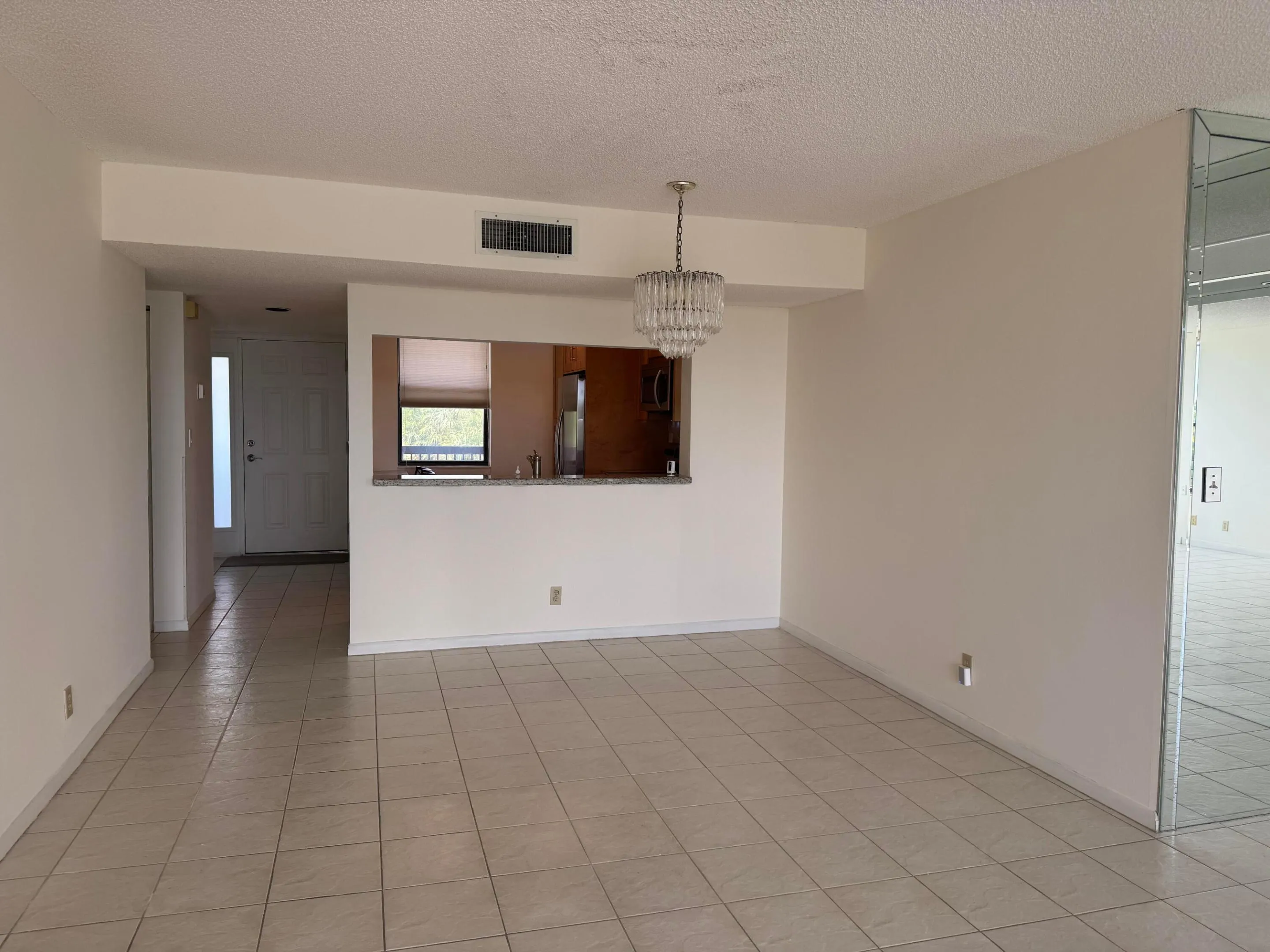 VIEW FROM FAMILY ROOM TO KITCHEN