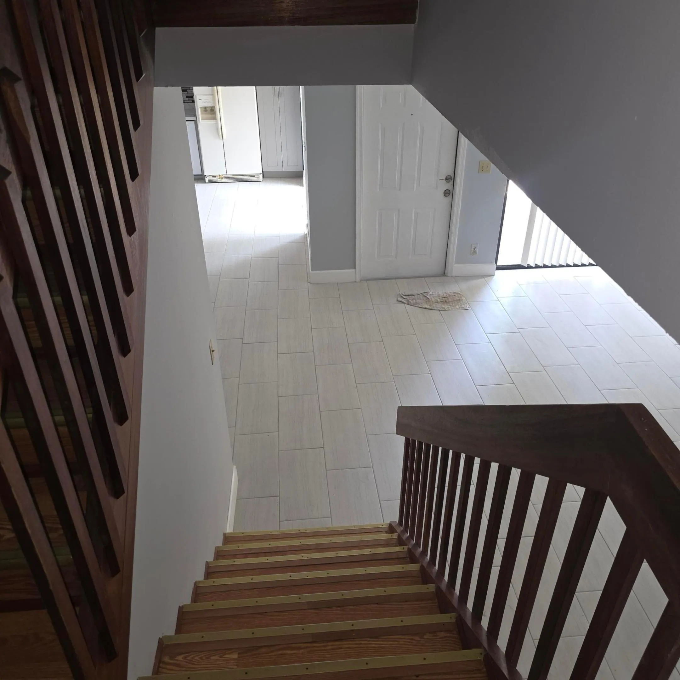 View of front door from stairway