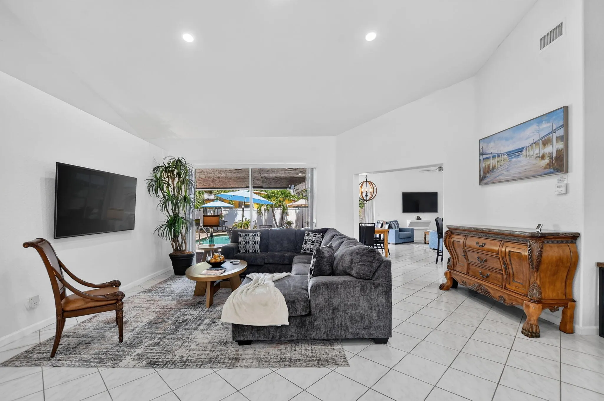 Vaulted ceilings and tile flooring enhance this bright interior