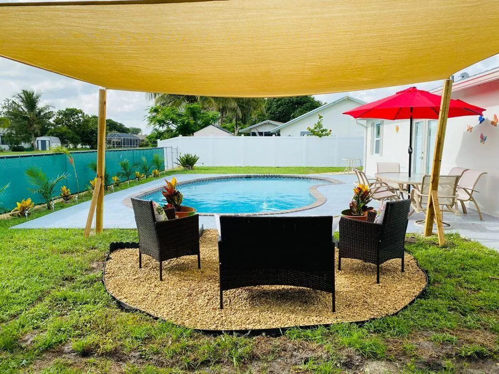 Boca Pool sitting area from behind