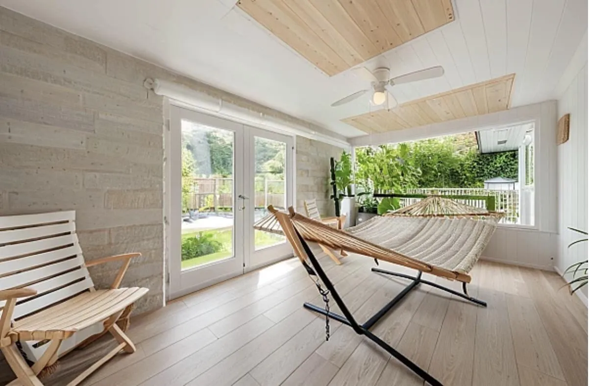 Virtually stage patio/sunroom, flooring and walls are different and some walls are unfinished