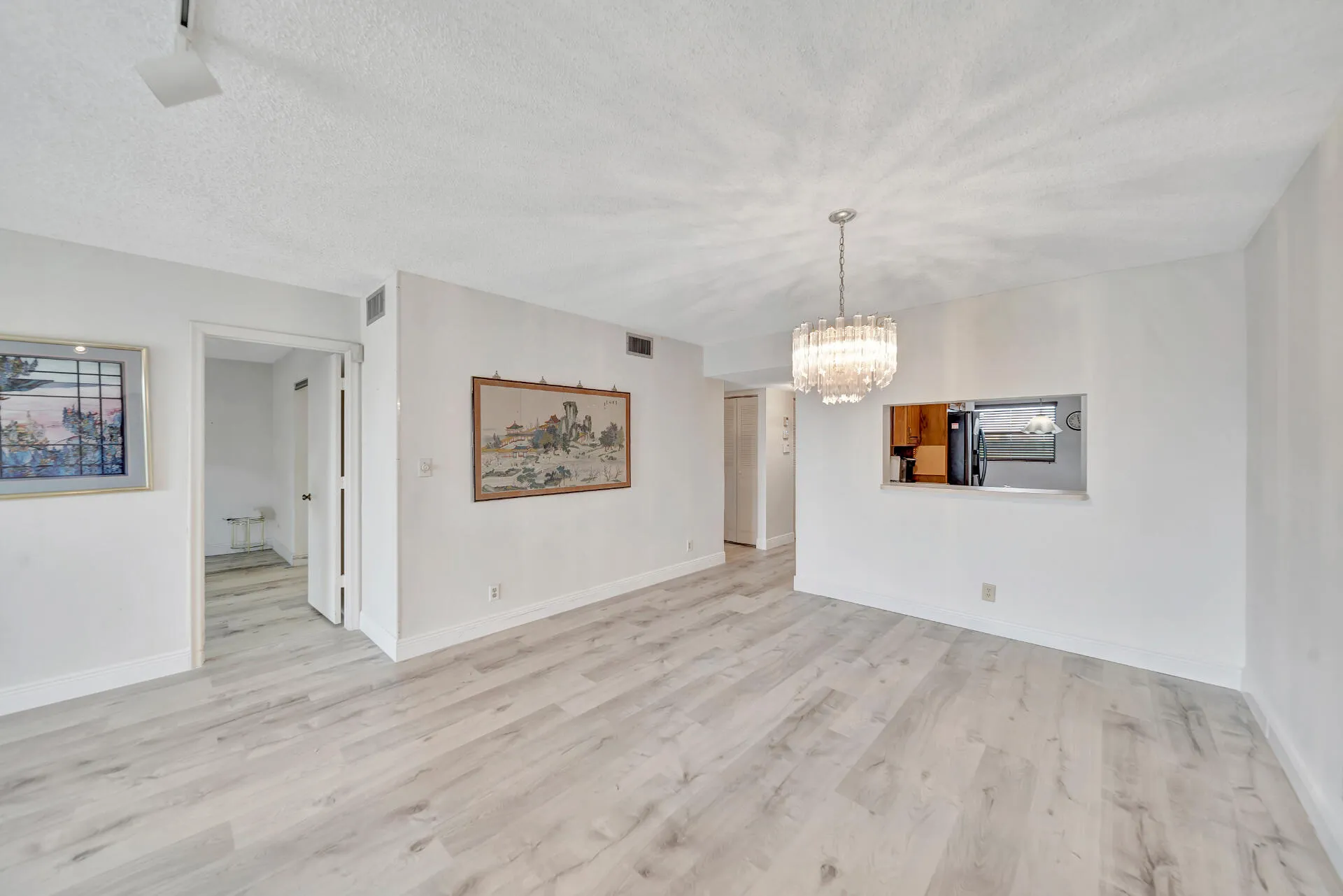 Dining Room; Kitchen Pass-Thru; and Primary Bedroom Entry