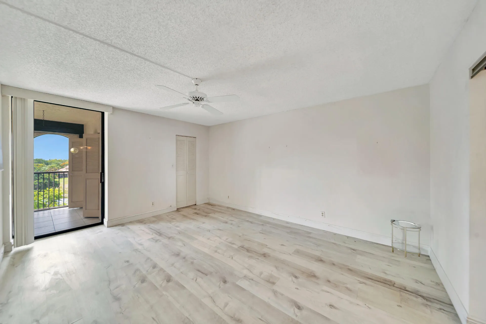 Primary Bedroom With Entry To Screened Balcony