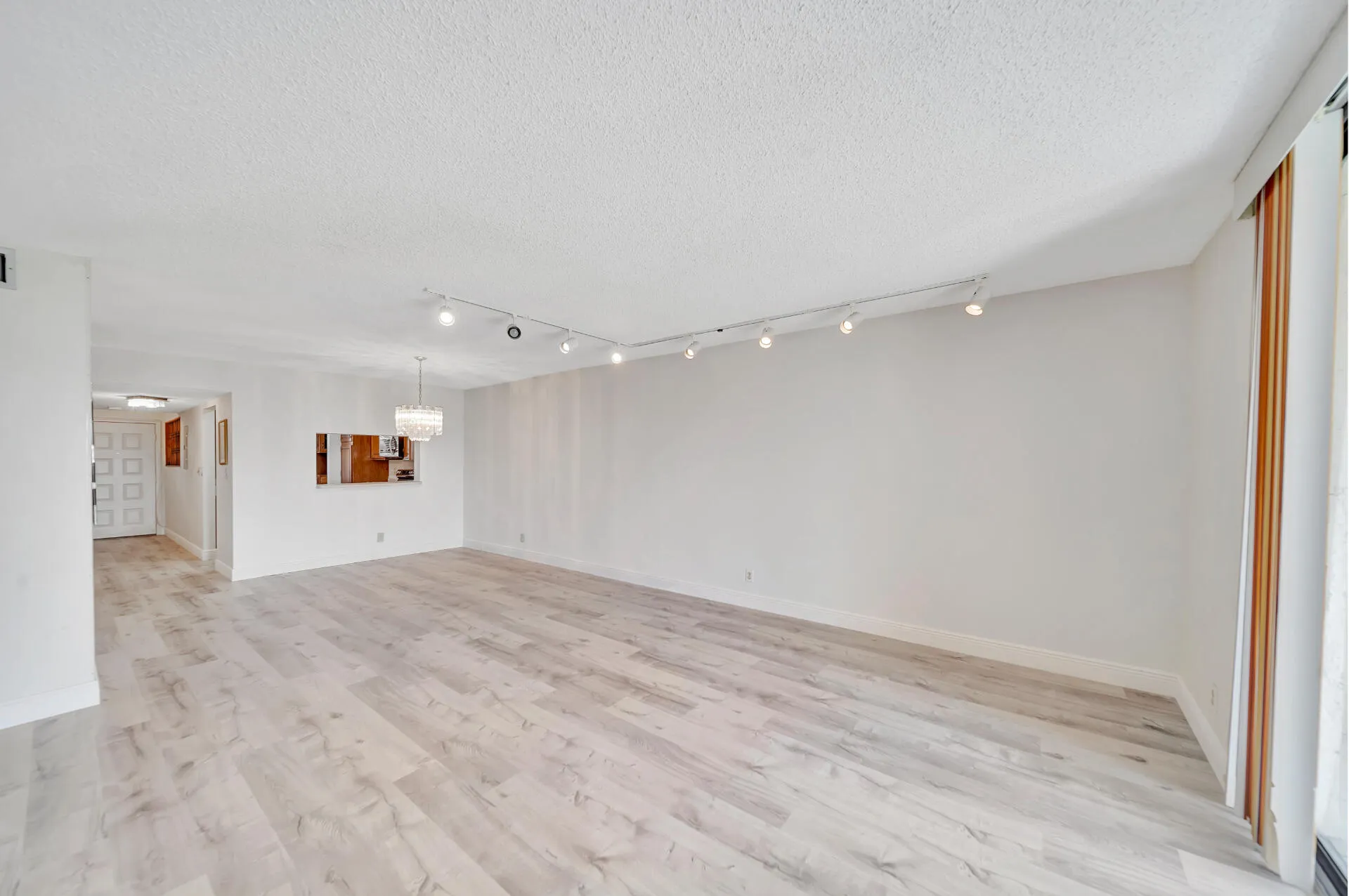 Living Room; Dining Room; Kitchen Pass-Thru