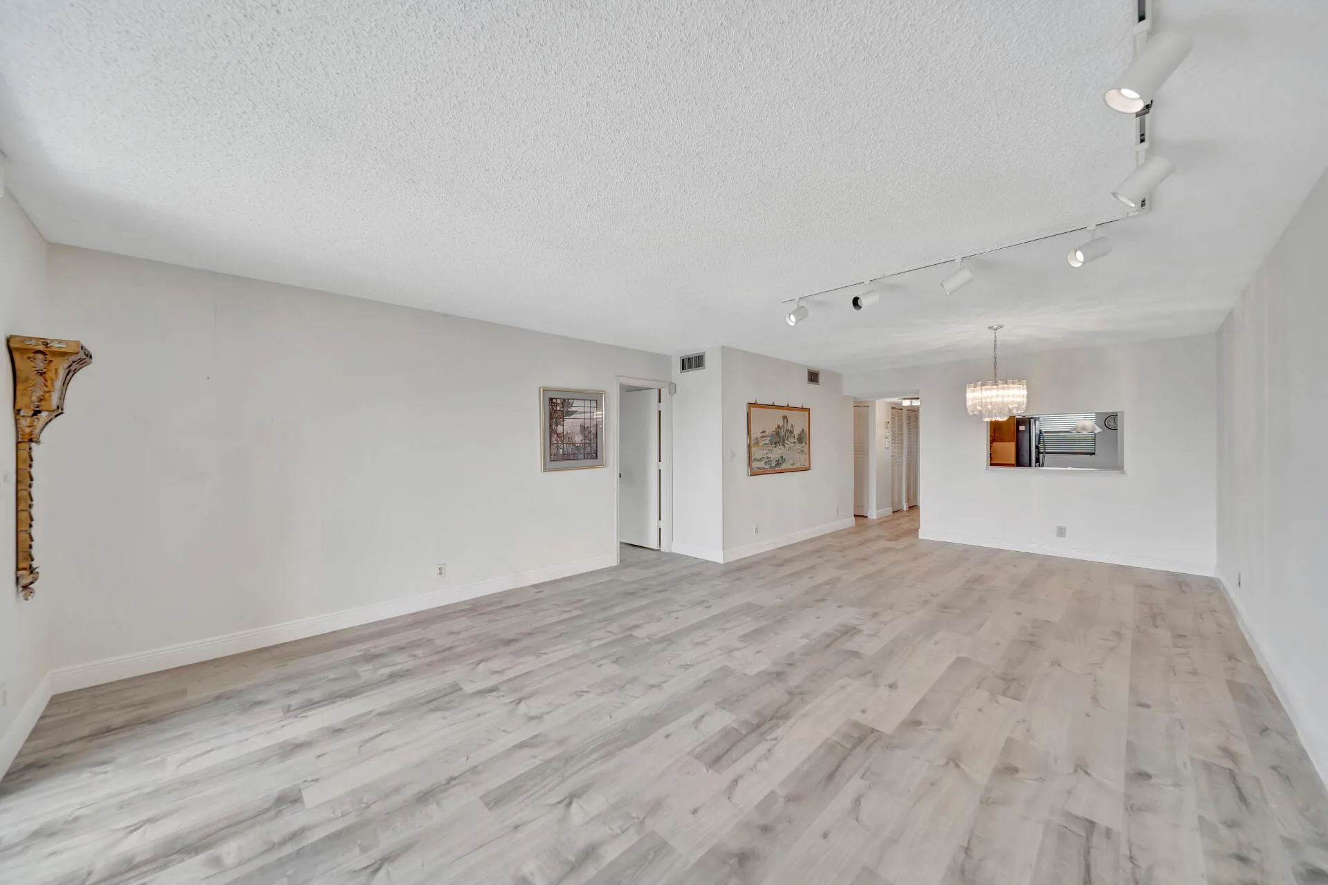 Dining Room; Kitchen Pass-Thru; and Primary Bedroom Entry