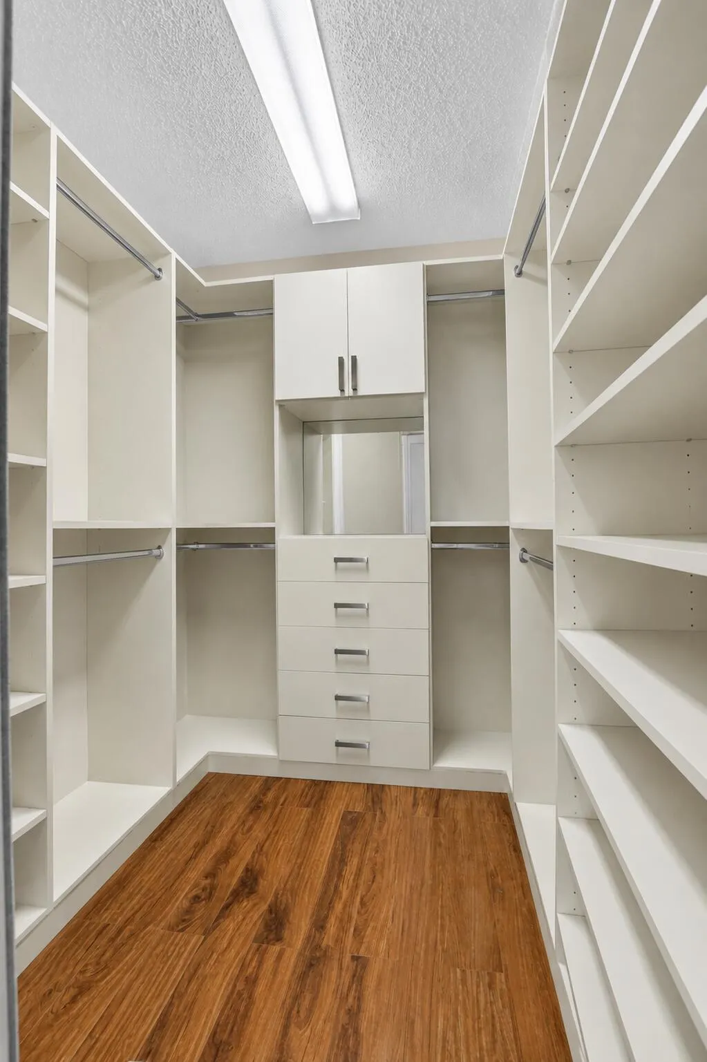 Custom closet in primary bedroom.