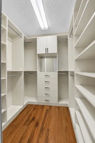 Custom closet in primary bedroom.