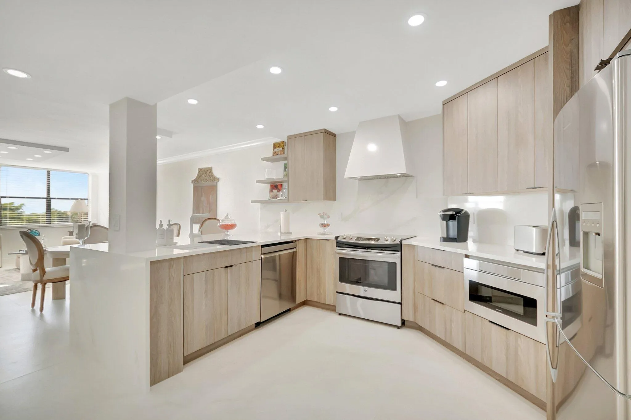 Spacious open kitchen with eat in counter space.