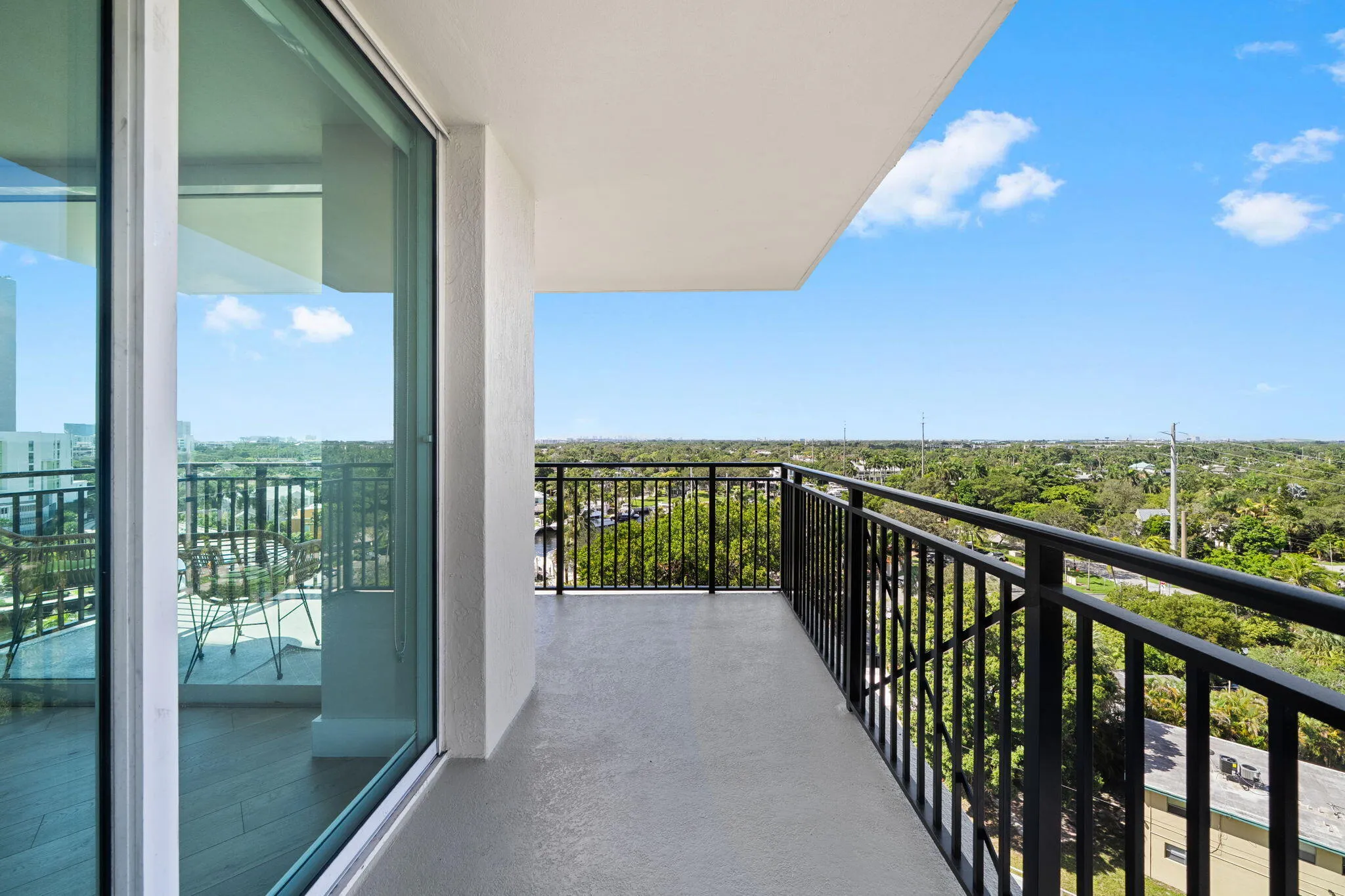 Generous wraparound terrace extending the living space outdoors, with room for seating, dining & enjoying the southwest exposure.