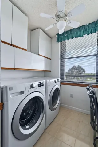 Full size washer and dryer inside unit