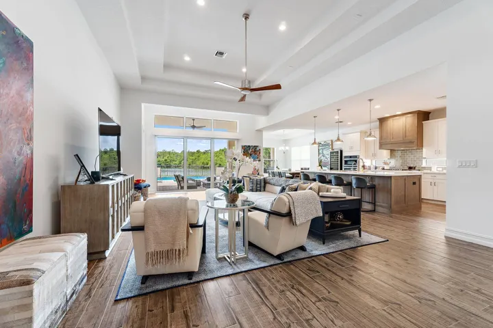 modern interiors offer volume ceilings + custom open kitchen floorplan