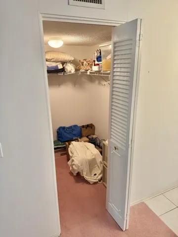 Closet In Primary Bedroom