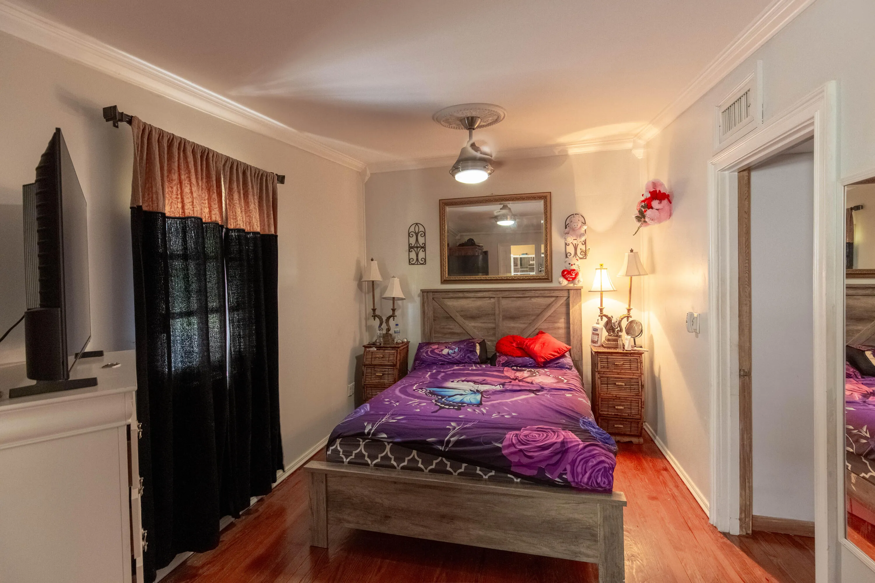 master bedroom with custom Armoirs