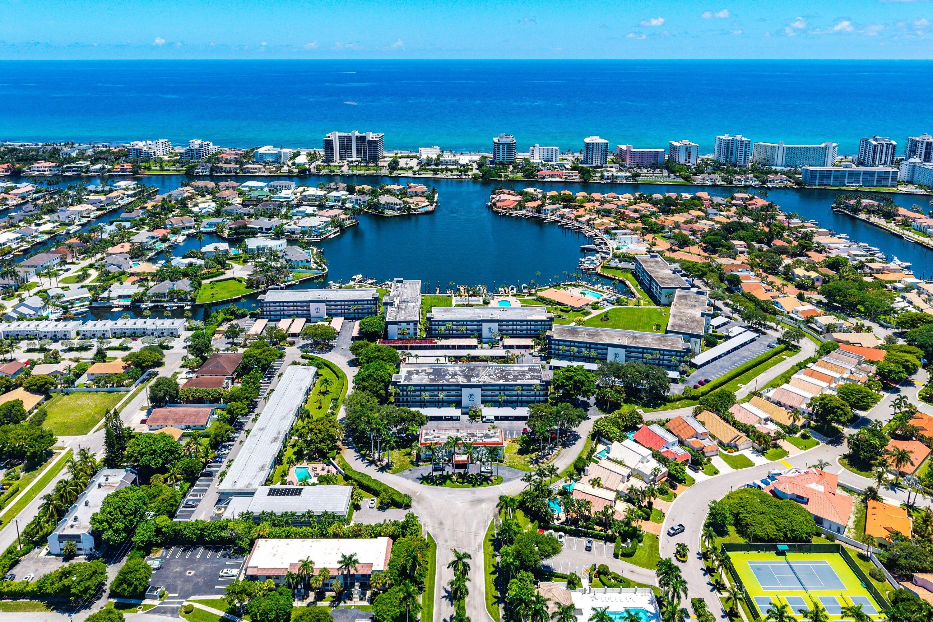 Coastal community with direct ocean access, waterfront properties, multiple marinas, and a tennis court