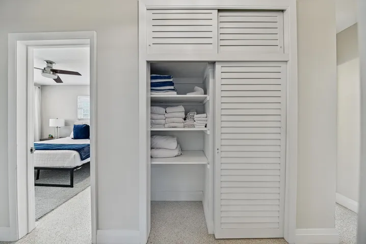 Louvered bifold doors with internal shelving