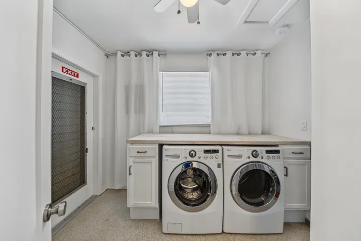 Laundry area with white cabinetry, a light-colored countertop, and a ceiling fan