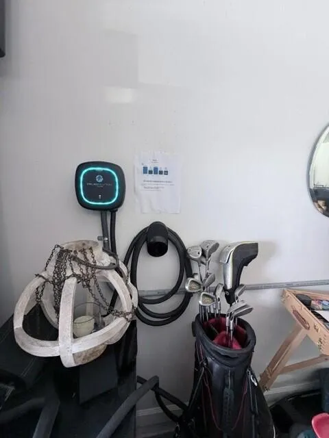 This home is equipped with an FPL Evolution Home electric vehicle charging station for convenient at-homer EV charging. A valuable modern upgrade, it makes powering your electric vehicle. affordable, and easy without leaving home.