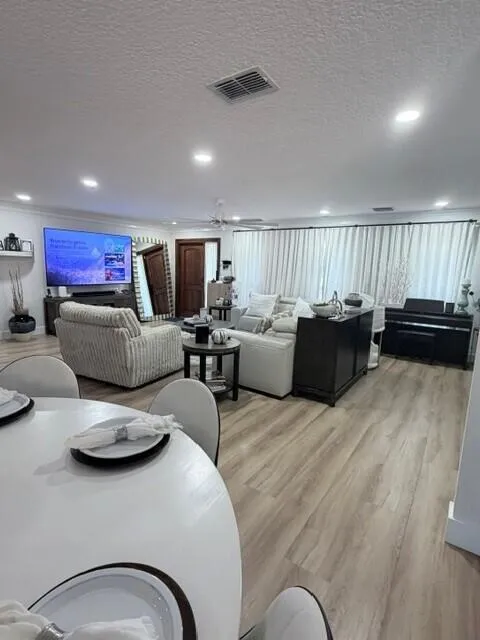 A warm inviting space designed for privacy on family movie nights.