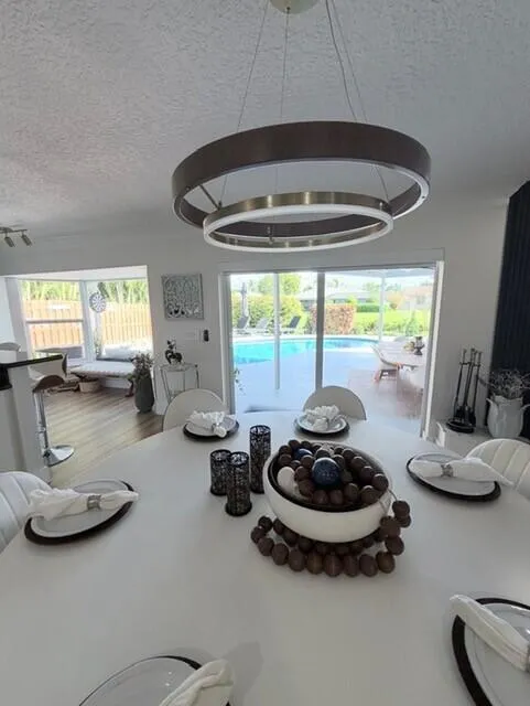 Enjoy beautiful pool and backyard views right from the dinning room table, bringing the outdoors into everyday living.
