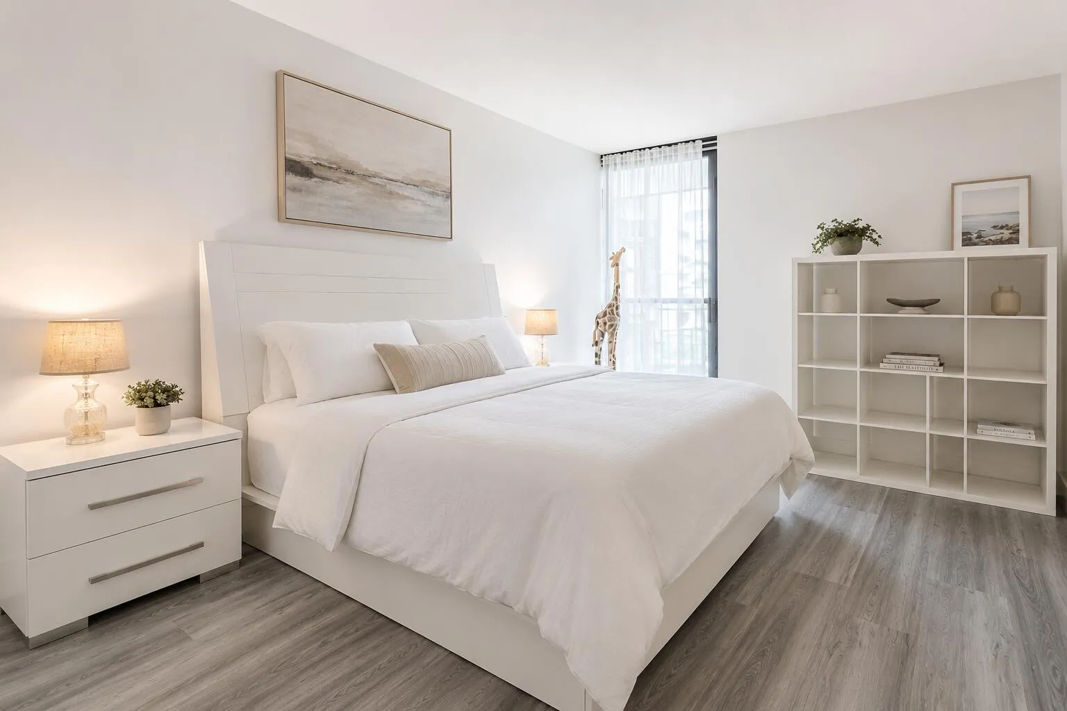Comfortable guest bedroom with ample closet space and balcony access