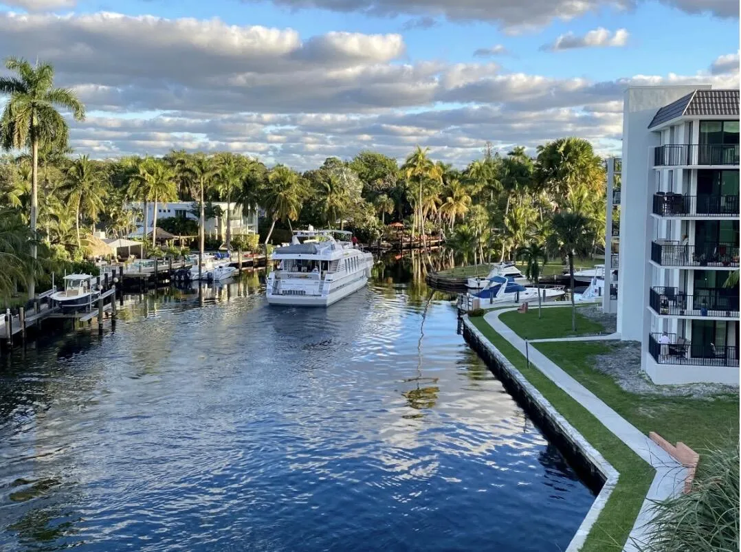 Waterfront views, with yachts cruising by.