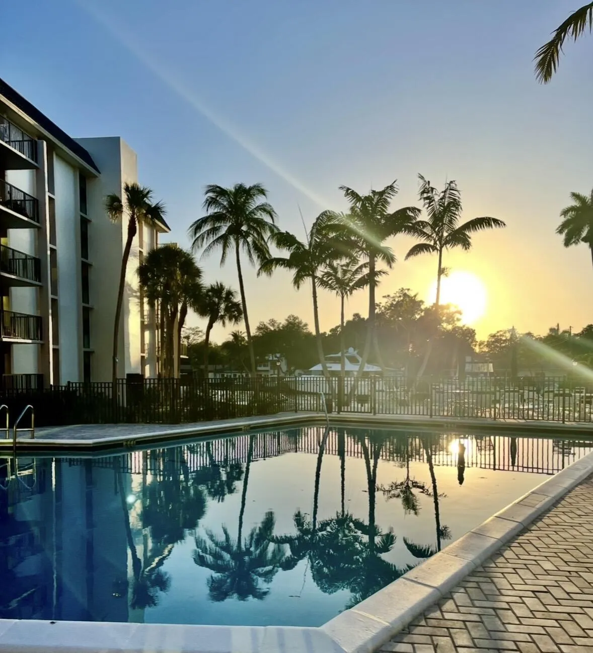 Inviting pool surrounded by tropical landscaping with breathtaking views