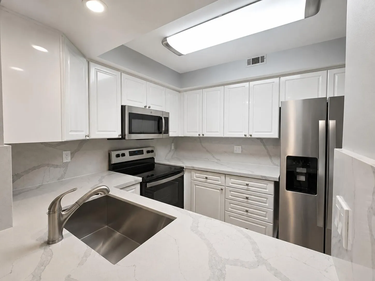 Kitchen with stainless steel appliances
