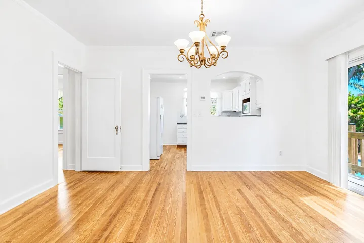 VIEW INTO KITCHEN FROM DINING