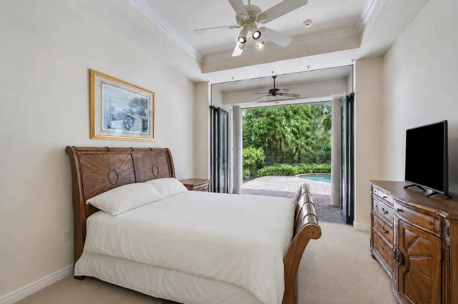 First Floor bedroom with full bath and direct access to pool