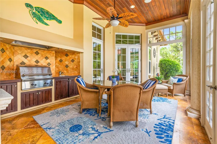 Summer kitchen, screened patio & entry to casita