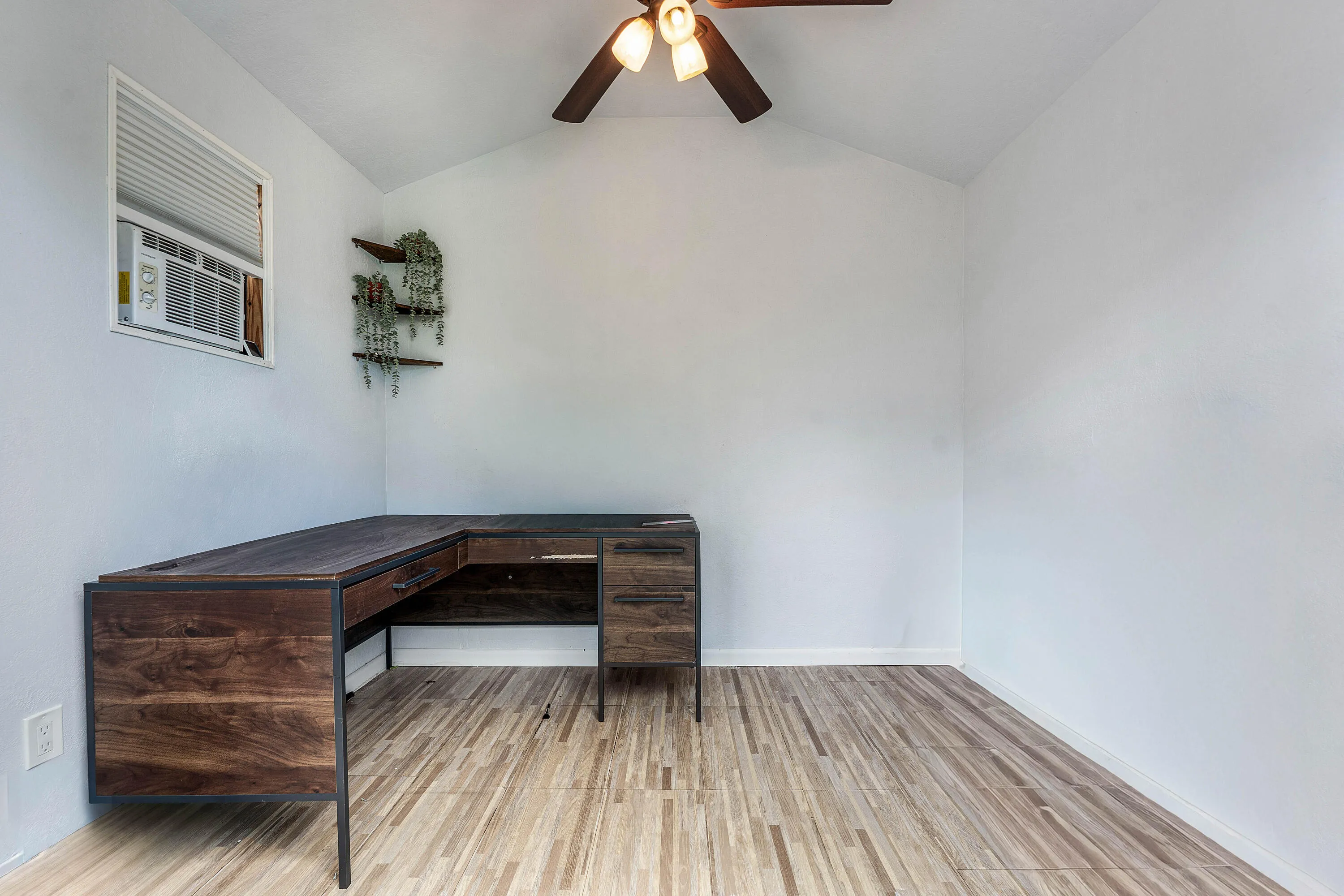Air conditioned shed used a soffice. NOT STAGED