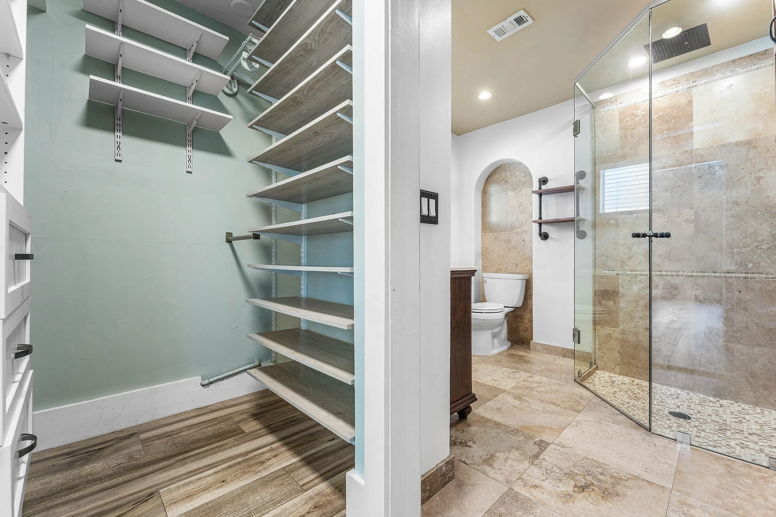 Primary closet and bathroom