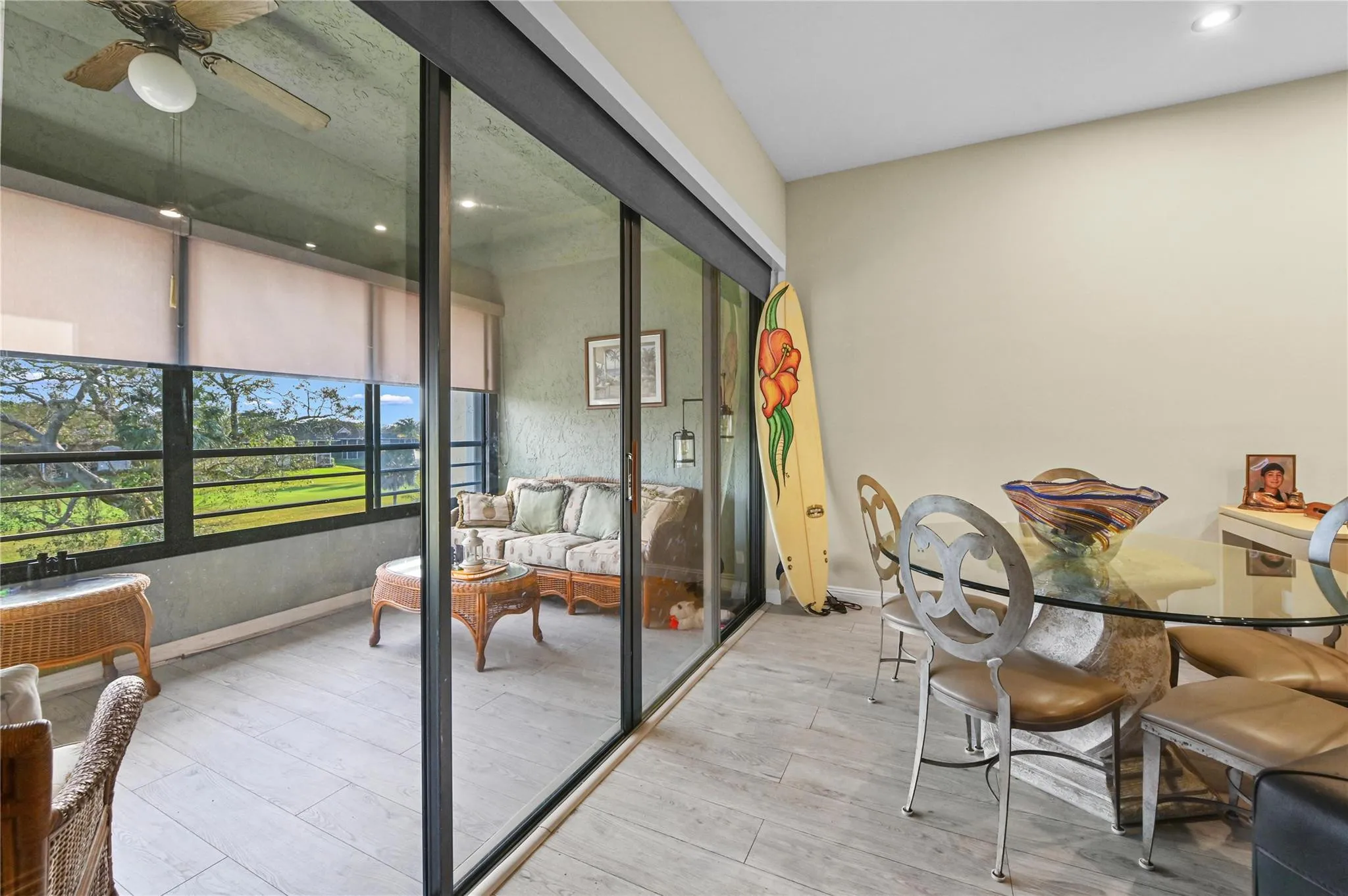 Large enclosed patio overlooking golf course and lake view