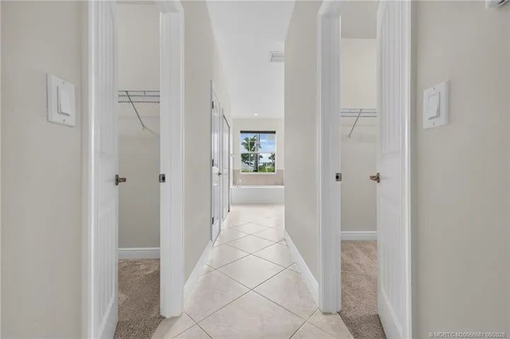 Two Walkin Closets between Master Bedroom and Bathroom