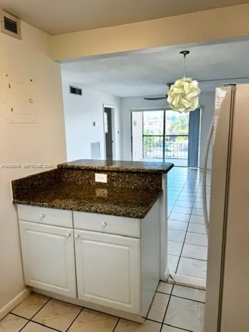 Open to dining and living area